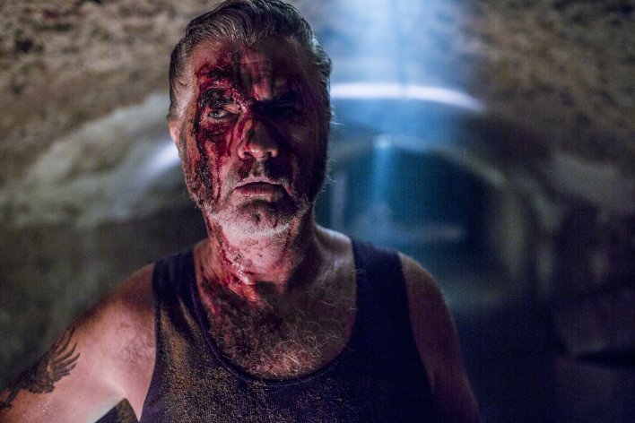 John Jarratt as Mick Taylor