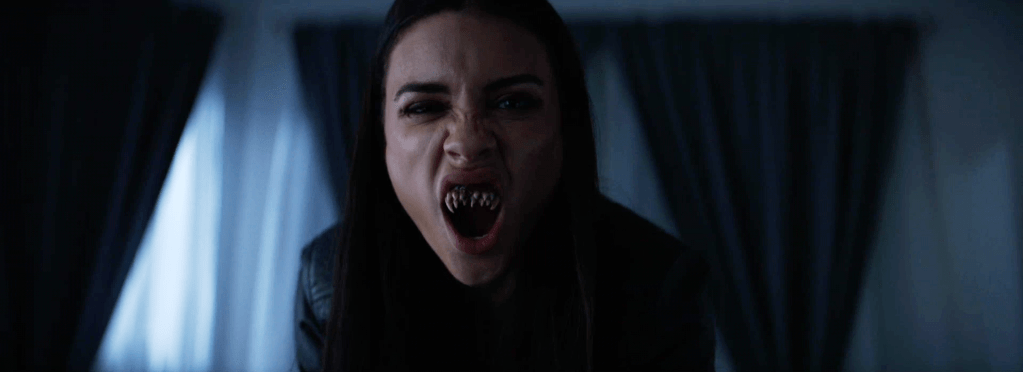 Image of women with fangs bared